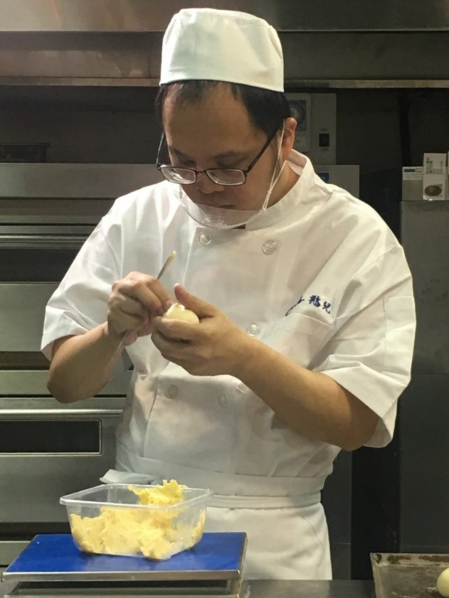 20年如1日專心投入 喜憨兒成冠軍麵包師傅